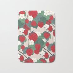 a strawberry and flower pattern on a white background