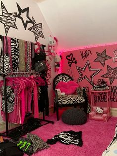 a room filled with zebra print and pink carpeted flooring next to a white wall