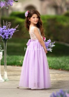 Dress your little one in elegance with our Lavender Sleeveless Tulle Flower Girl Dress! Featuring a soft white lace bodice and flowing lavender tulle skirt, it pairs perfectly with our matching bridal accessories for Romantic, Shabby Chic, Vintage, Modern, and Classic Wedding Themes. Ideal for portraits and parties. How to Order: Dresses are true to size. Please measure to ensure best fit. *Select your preferred sash style and then leave the sash color in the cart notes at checkout. Additional O Spring Flower Girl Dresses, Flower Girl Dresses Purple, Lavender Flower Girl Dress, Bohemian Flower Girl Dress, Dance Portraits, Burgundy Flower Girl Dress, Purple Flower Girls, Vintage Flower Girls, Rustic Flower Girl Dress