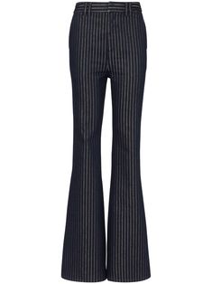 Balmain Striped high-rise Flared Jeans - Farfetch High Fashion Streetwear, Balmain Pants, Balmain Women, Elegant Pants, Country Vibes, Balmain Clothing, Womens Flare Jeans, Classy Fits, Elegant Pant