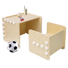 two children's tables and chairs made out of plywood with soccer ball on the table