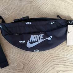 Nike Waist Pack -Padded, Adjustable Strap Allowing You To Customize Your Fit -Light And Durable Fabric -Adjustable Strap Lets You Customize Your Fit -Zippered Pockets Provide Secure Small-Item Storage -16"L X 4"W X 6"H -Polyester -Zipper Closure Brand New W/ Tags! Nike Bags, Small Item Storage, Belt Bags, Waist Pack, Men's Nike, Belt Bag, Black Nikes, Nike Men, Adjustable Straps