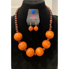 Orange Wooden Bead Necklace With Matching Earrings. Orange Beads As A Gift, Adjustable Orange Necklace With Wooden Beads, Orange Polished Beads Necklace, Orange Jewelry With Wooden Beads For Gifts, Orange Jewelry With Wooden Beads As A Gift, Orange Jewelry With Colorful Round Beads, Orange Dangling Beads For Jewelry Making, Orange Wooden Beads For Jewelry Making, Orange Large Beads For Jewelry Making