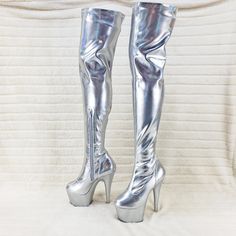 7" (178mm) Heel, 2 3/4" (70mm) Platform Stretch Thigh High Boot 1/2 Length Inside Zip Closure Color: Stretch Silver Hologram Us Woman's Sizes 5-14 (Ny Warehouse) New In Box Party High Cut Platform Heeled Boots, Glamorous High Heel Boots For Club, Platform Thigh High Boots For Party, Thigh High Platform Boots For Party, Silver Fitted Knee-high Boots, Fitted Silver Glamorous Knee-high Boots, Silver Knee-high Boots For Night Out, Silver Fitted Platform Heels, Fitted Silver Platform Heels