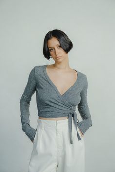 With a deep neckline and cropped cut, our Dance Wrap Top is a flattering, feminine play on a classic ballet wrap tee. Designed from our classic, beautifully textured 100% silk noil jersey, it’s made for customization, able to be styled both single and double-wrapped depending on how your preferred fit. An adaptable, any-season staple. Elegant Cropped Top For Loungewear, V-neck Wrap Top For Loungewear, Fitted Tops With Surplice Neckline For Fall, Chic Wrap Tops For Loungewear, Fitted Wrap Crop Top For Fall, Versatile Wrap Top For Loungewear, Versatile Fitted V-neck Wrap Top, Stretch Wrap Top For Loungewear, Versatile Fitted Wrap Top