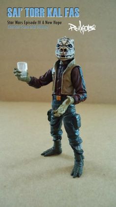 a star wars action figure holding a cup