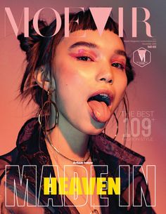 a magazine cover with a woman sticking her tongue out