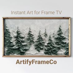 an arty frame with trees painted on it