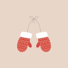 two red mittens hanging from a string on a beige background with a white bow