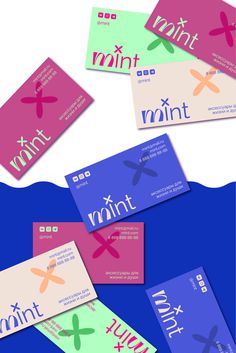 four different colored business cards with the word mintt written on them in multiple languages