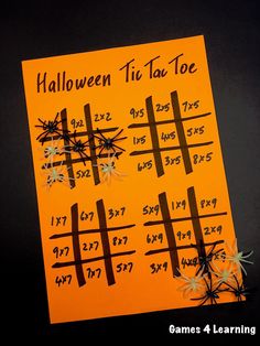 a halloween tic - tac toe game for kids to play on the table