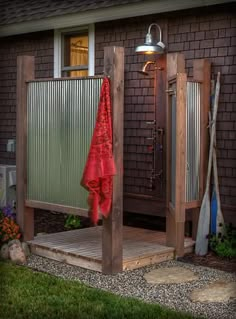 an outdoor shower that will help you let loose water in your house and keep it clean