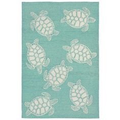 a blue rug with turtles on it