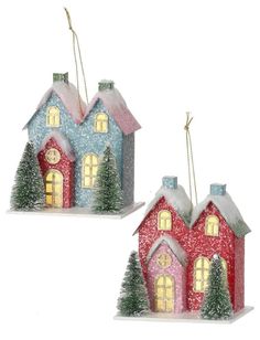 Christmas ornament shaped like a cute house with two trees in the front. One is blue with a red door and one is red with a pink door. LED lights are visible inside from the windows. Puts Houses, Paper Village, Winter Houses, Paper Buildings, Putz House, Box Crafts, Christmas Houses, Wedding Shower Decorations, Christmas Village Houses