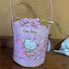 Pink Drawstring Hello Kitty Fairy Basket Bag Made From A Water Resistant Material Can Be Used For Toiletries Or Even At The Beach Never Been Used, Still Has Tag On It Has One Minor Flaw At Bottom Of Bag. Shown In Last Picture. Was Purchased This Way. Open To Offers! Cute Pouch Bucket Bag For Daily Use, Cute Daily Use Pouch Bucket Bag, Cute Bucket Bag For Daily Use, Pink Bucket Bag With Removable Pouch As Gift, Cute Hello Kitty Shoulder Bag For Gift, Cute Hello Kitty Shoulder Bag As Gift, Cute Pink Bucket Bag, Fairy Basket, Hello Kitty Fairy