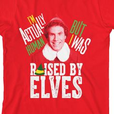 a red t - shirt with the words i'm actually human, but i was raised by elves on it