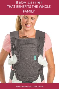 a woman wearing a baby carrier with the words, baby carrier that benefits the whole family