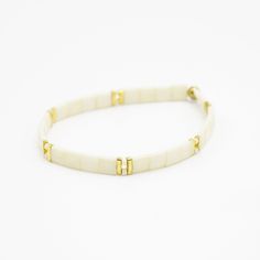 Buy 3 Get 1 Free! Discount automatically applies at checkout! Our tila bead bracelets are made with a very strong, expensive, and durable crystal elastic. You can wear them at the beach, while working out, or even in the shower! Sizes are similar to your t-shirt size. The most common way to wear them is in a set of 3, or mix them with tons of other bracelets and stack your wrists. Each bracelet is handmade!! Adjustable Flexible Stretch Bracelet For Everyday, White Adjustable Flexible Bracelets, Adjustable Flexible White Bracelets, Adjustable White Flexible Bracelets, Adjustable Bone-colored Bracelet, Royal Blue Bracelet, Tila Bead Bracelets, Match Bracelets, Bronze Tiles