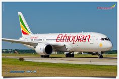 an ethiopian airliner on the runway with grass and blue sky in the foreground