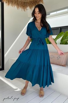 Refresh and renew with our blue flowy midi dress, the Barker Dress in Teal 🦋 Your ideal summer brunch dress is one click away! Tap to shop this cute summer dress now! ✨ V-neck Midi Dress With Tie Waist For Vacation, Summer Midi V-neck Dress With Tie Waist, Summer Flowy V-neck Dress With Tie Waist, Flowy Summer V-neck Dress With Tie Waist, Chic V-neck Midi Dress With Tie Fastening, Summer V-neck Maxi Dress With Tie Fastening, Summer Belted Maxi Dress For Brunch, Summer Brunch Belted Maxi Dress, Casual Maxi Length Wrap Dress With Tie Waist