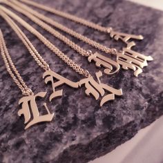 Layered Necklaces Gold, Old English Letters, Ring Stacks, English Font, Old English Font, Bamboo Earrings, Jewellery Necklaces, Necklaces Gold, Midi Rings