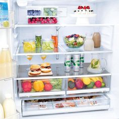 an open refrigerator filled with food and drinks