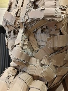 a cardboard sculpture made to look like a man's face