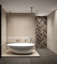 a large white bath tub sitting inside of a bathroom next to a walk in shower