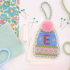 the sewing supplies are laid out on the table