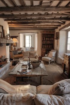 a living room filled with furniture and a fire place