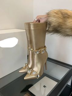 Close-up of the crystal embellishments on the knee-high boots, highlighting their sparkle. Golden Atelier 12 Old Fashioned Words, Crystal Boots, Cute Shoes Heels, Fantastic Shoes, Shoes Ideas, High Fashion Outfits, Fancy Shoes, Shoe Inspiration, Stylish Boots