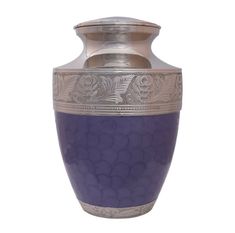 a large purple vase with silver trimmings on the top and bottom, sitting in front of a white background