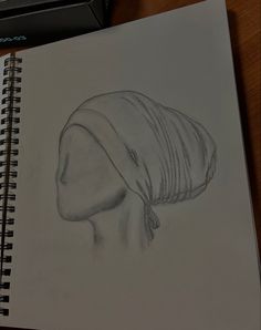 a pencil drawing of a woman's head