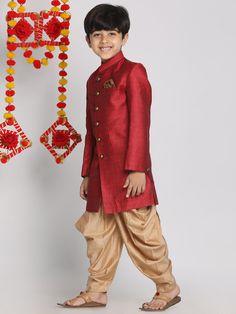 VASTRAMAY Boys Maroon Indo Western Jacquard Sherwani and Dhoti Pant Set Get your little one dressed in this charming maroon Indo Western Jacquard Sherwani and Dhoti Pant Set from VASTRAMAY. Perfect for weddings, festivals, and special occasions, this set features intricate detailing and a comfortable fit. Crafted from high-quality fabric, it offers a blend of style and comfort for your child. Features: Color: Maroon Material: Jacquard Style: Indo Western Occasion: Festive, Wedding Fit: Comfort S Fitted Sherwani For Puja During Diwali, Red Bandhgala For Navratri Festival, Fitted Bandhgala With Dabka For Puja, Fitted Bandhgala For Puja During Eid, Red Dabka Sherwani For Navratri, Red Bandhgala For Festive Traditional Ceremonies, Red Festive Bandhgala For Traditional Ceremonies, Fitted Self Design Sherwani For Puja, Fitted Self-design Sherwani For Puja