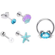 Product Details16 Gauge Blue Gem Nautical Labret Segment Ring Ear Curation Set of 5 Get ready to ride a wave of style with this multi-piece set of 16 gauge cartilage jewelry. You get a 10mm duable 316L surgical grade stainless steel hinged circular ring that features a blue gem crab charm. It also features a non-removable, hinged segment that makes insertion and removal a breeze. You also get two 8mm durable 316L surgical grade stainless steel straight posts with flat disc ends. One labret featu Ear Curation, Cartilage Ring, Cartilage Jewelry, Stainless Steel Hinges, Lip Ring, Blue Gems, Belly Rings, Nose Piercing, Tragus