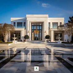 a large white building with columns and windows