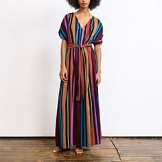 Condition: Excellent, Worn Only A Few Times! Fabric: A Blue-Black Lightweight Singlecloth With Multicolored Variegated Satin Stripes. 100% Cotton Style: Maxi Dress With V-Neck, Cap Sleeves, Elastic Waist With Tie, Pockets And Colorful Stripe (From Spring '18) True To Size Multicolor Belted Bohemian Dresses, Multicolor Belted Maxi Dress, Multicolor Belted V-neck Dress, Striped V-neck Dress With Tie Waist, Chic Multicolor Belted Maxi Dress, Fitted Multicolor Dress With Tie Waist, Ribbon Candy, Ace And Jig, Style Maxi Dress