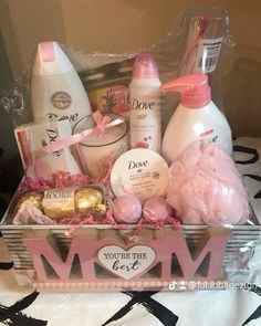 a basket filled with personal care items on top of a bed