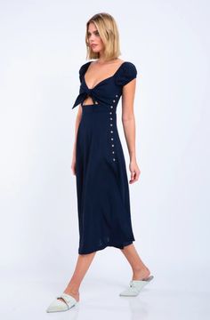 Sway along the white sand in the Astwood Cove Navy Off-the-Shoulder Midi Dress! Woven fabric makes this laid-back dress perfect for the season, while cute off-the-shoulder puff sleeves add femme flair. Off-the-shoulder neckline tops the princess-seamed bodice, while a full button placket travels along the side into the relaxed midi skirt slit. High waist with cutout and front-tie finish the look. Smocked back for a perfect fit. Brunch Garden, Cutout Midi Dress, Midi Dress Chic, Boho Boutique, Color Ways, Tie Front Dress, Pink Boho, Natural Tan, Sun Dress