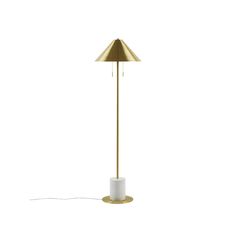 a white and gold floor lamp on a white background