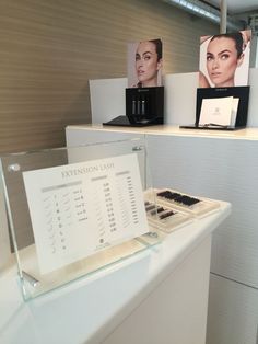 a display case with makeup products on it