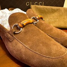 Gucci's Loafers Are Brown Suede And Feature The Brand's Iconic Bamboo Detail. Made In Italy, The Pair Is Finished With A Leather Sole. Very Clean , Excellent Condition No Damage. Original Box And Dust Bags Size Us 10.5 Luxury Brown Gucci Loafers, Gucci Designer Brown Loafers, Designer Brown Gucci Loafers, Gucci Luxury Slip-on Loafers, Gucci Suede Loafers With Leather Sole, Designer Brown Loafers With Suede Lining, Designer Gucci Loafers With Leather Lining, Gucci Suede Formal Loafers, Gucci Suede Loafers For Formal Occasions