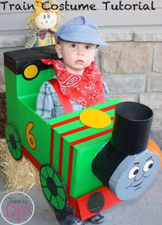 a young boy dressed up as thomas the train