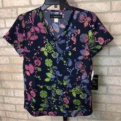 Size Xs And 5x, New With Tags Perfect Condition Never Been Worn, Navy Background With Multi Color Paisley Print, Short Sleeve, V Neck, Comfortable, Koi Basics Casual Multicolor Paisley Print Tops, Blue Fitted Top With Paisley Print, Blue V-neck Top With Colorful Pattern, Fitted Blue Top With Paisley Print, Blue V-neck Top With Vibrant Print, Casual Purple Top With Paisley Print, Casual Purple Paisley Print Top, Pink Paisley Print V-neck Top, Pink V-neck Top With Paisley Print