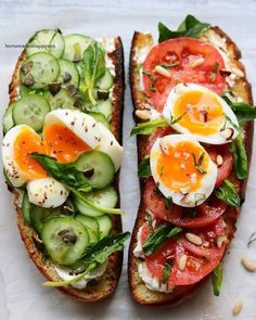 two slices of bread with tomatoes, cucumbers and hard boiled eggs on them