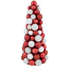 a red and white christmas tree with ornaments on it's top, in front of a white background