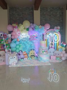 a birthday party with balloons and decorations