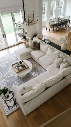 a large white sectional sofa in a living room