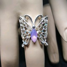 Stunning! Brand New W/O Tags..Sterling Silver Size 7 Butterfly Ring With A Beautiful Purple Main Stone With Small Yet, Very Bright Shiny Stones On The Wings Silver Butterfly Ring For Parties, Sterling Silver Party Rings With Bling, Silver Metal Crystal Ring For Party, Adjustable Silver Crystal Ring For Party, Silver Butterfly Jewelry For Wedding, White Butterfly-shaped Metal Jewelry, Silver Sterling Butterfly Ring For Wedding, Sterling Silver Bling Ring As Gift, Silver Nickel-free Crystal Ring For Wedding