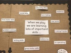 a bulletin board with words and pictures on it that say when we play, we are learning lots of important skills